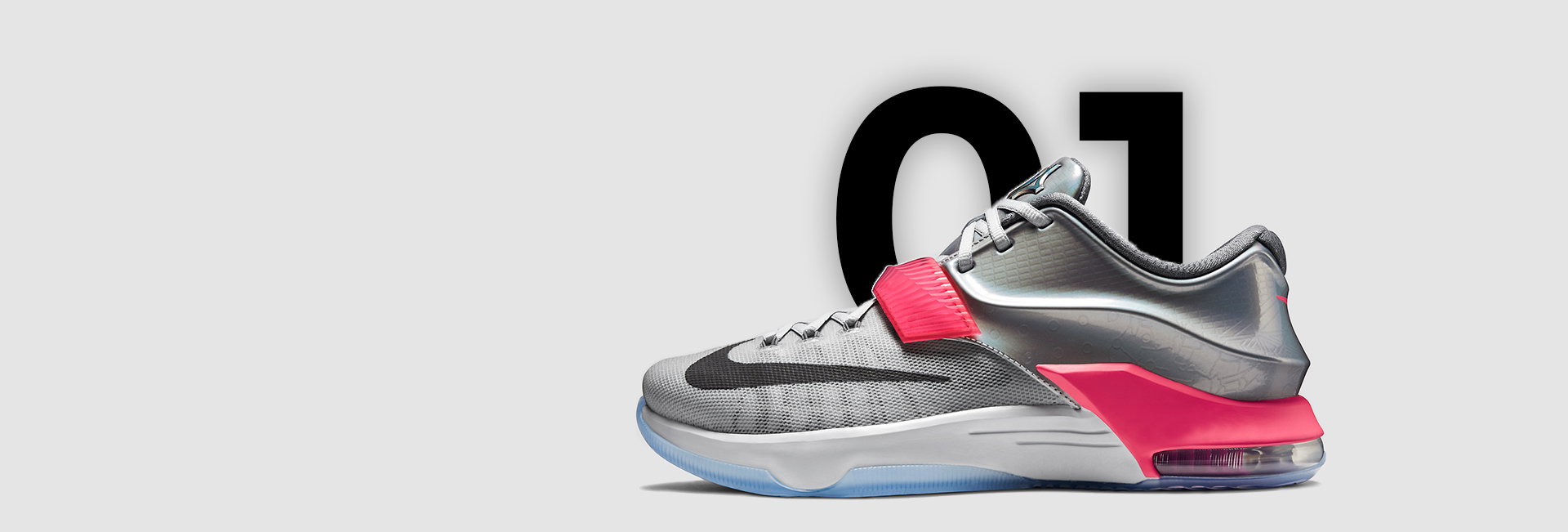 Gray performance sneaker with vivid coral details